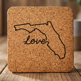 Florida square cork coaster engraved with a hand-drawn state outline and love in cursive