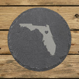 Florida round slate coaster engraved with the state shape and a heart
