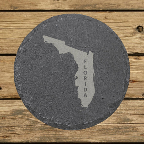 Florida round slate coaster with the engraved state shape and FLORIDA running vertically