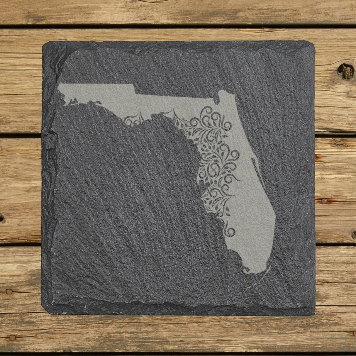 Florida square slate coaster engraved with the state shape in ornate floral scrollwork