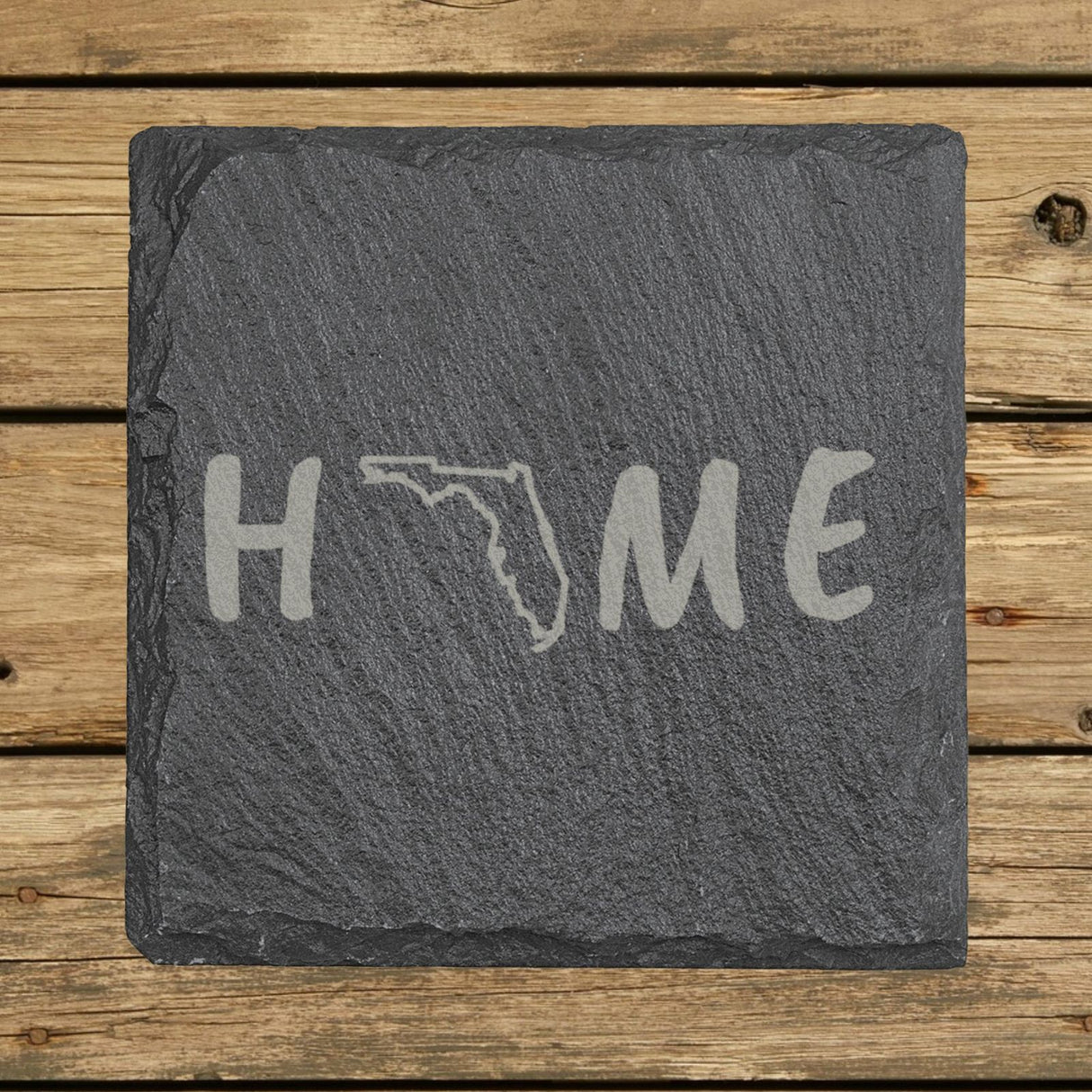 Florida square slate coaster engraved with HOME using the state outline as the letter O