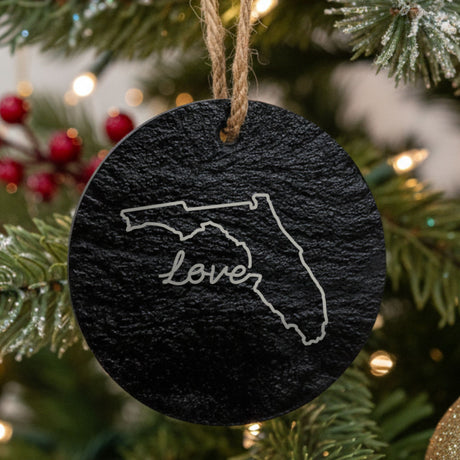 Florida round slate Christmas ornament engraved with a hand-drawn state outline and love in cursive