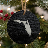 Florida round slate Christmas ornament engraved with the state shape and a star