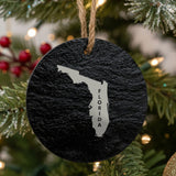 Florida round slate Christmas ornament engraved with the state shape and FLORIDA in vertical lettering