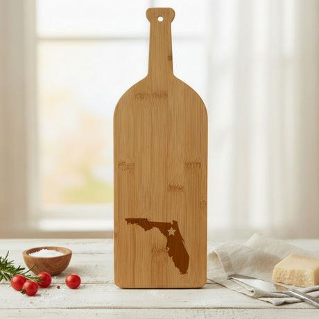 Bamboo wine bottle cutting board engraved with the Florida Star Accent design