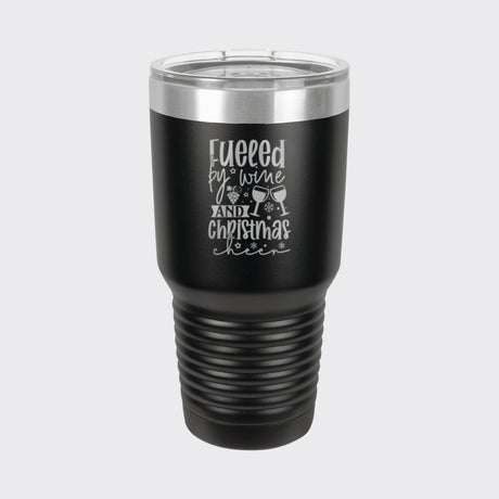 Black 30 oz tumbler laser engraved with "Fueled by Wine and Christmas Cheer"