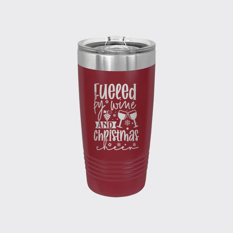 Maroon 20 oz tumbler laser engraved with "Fueled by Wine and Christmas Cheer"