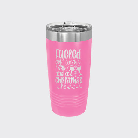 Pink 20 oz tumbler laser engraved with "Fueled by Wine and Christmas Cheer"