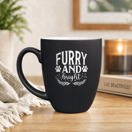 16 oz black ceramic coffee mug with "Furry and Bright (Paws)"