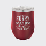 Maroon 12 oz stemless wine tumbler laser engraved with "Furry and Bright"