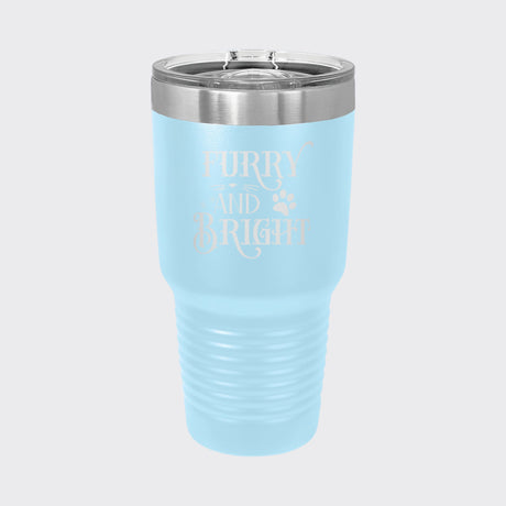 Light Blue 30 oz tumbler laser engraved with "Furry and Bright"