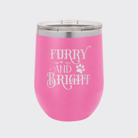 Pink 12 oz stemless wine tumbler laser engraved with "Furry and Bright"