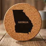 Georgia round cork coaster engraved with the state shape and GEORGIA in bold lettering