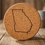 Georgia round cork coaster engraved with a clean state outline