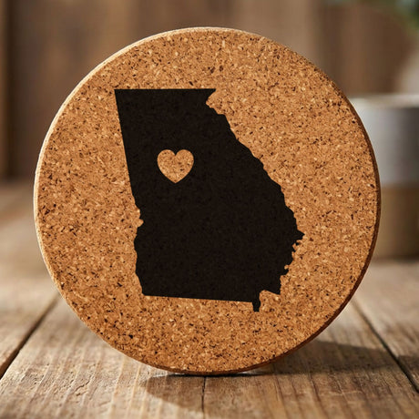 Georgia round cork coaster engraved with the state shape and a heart