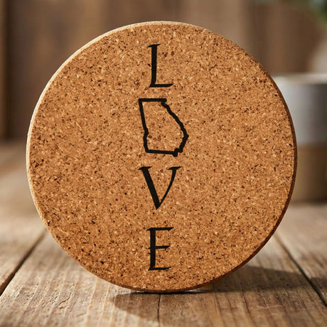 Georgia round cork coaster engraved with LOVE stacked vertically using the state as the letter O