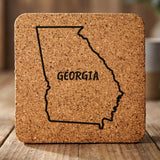 Georgia square cork coaster engraved with the state outline and GEORGIA in hand-drawn brush lettering