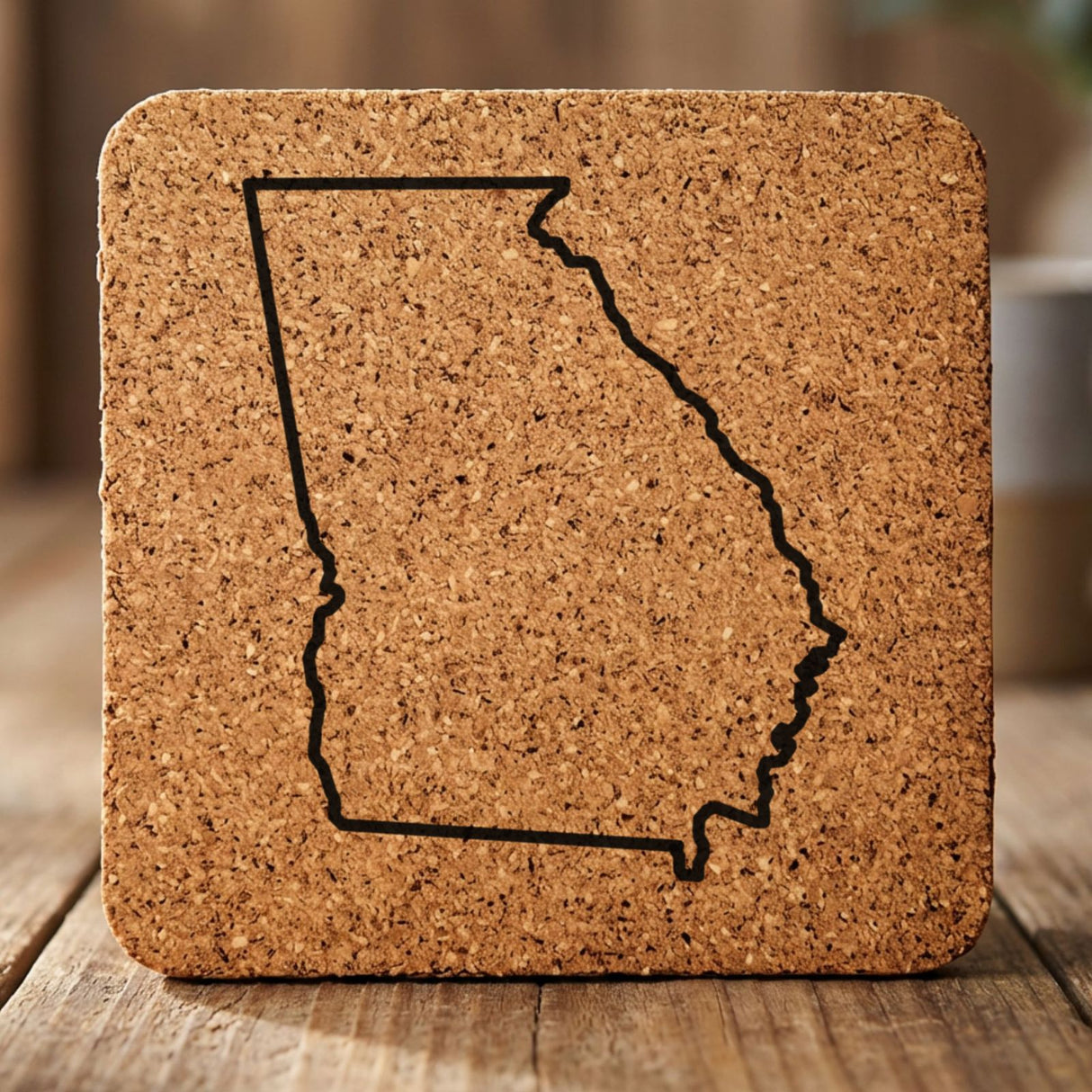 Georgia square cork coaster engraved with a clean state outline