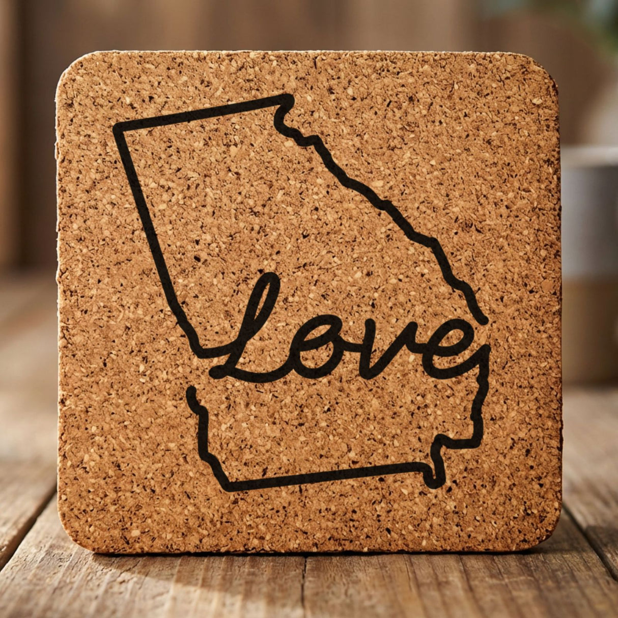 Georgia square cork coaster engraved with a hand-drawn state outline and love in cursive