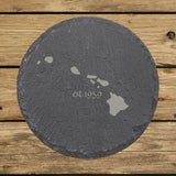 Hawaii round slate coaster engraved with the state outline and est. 1959