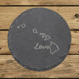 Hawaii round slate coaster engraved with a hand-drawn state outline and love in cursive