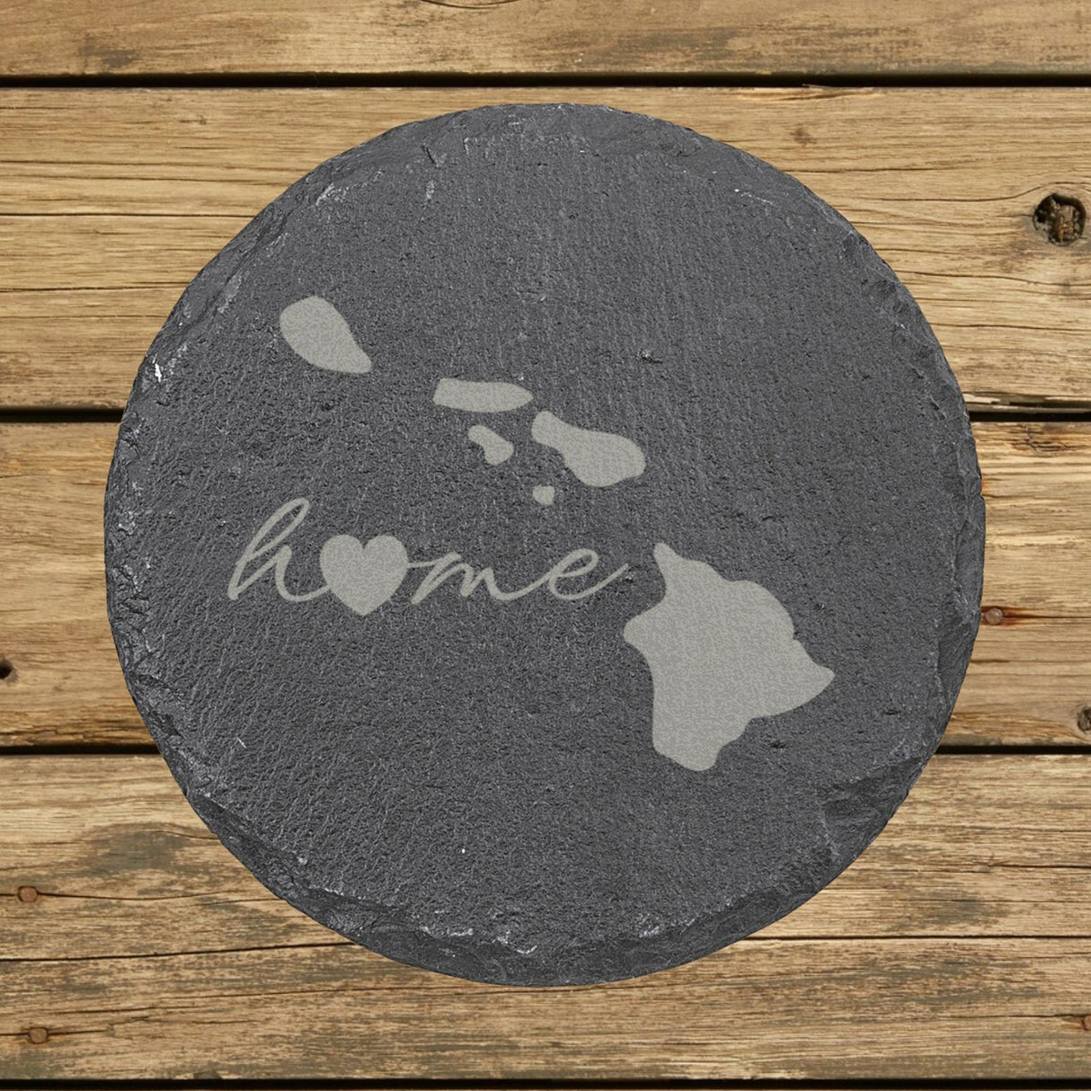 Hawaii round slate coaster engraved with the state outline and home in script with a heart