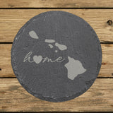 Hawaii round slate coaster engraved with the state outline and home in script with a heart