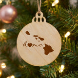 Hawaii round wood Christmas ornament engraved with the state outline and home in script with a heart