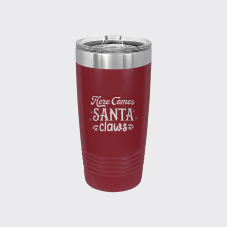 Maroon 20 oz tumbler laser engraved with "Here Comes Santa Claws"