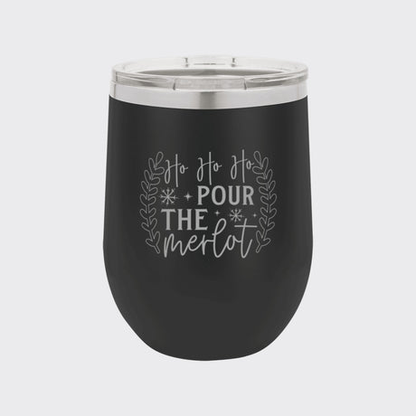 Black 12 oz stemless wine tumbler laser engraved with "Ho Ho Ho, Pour the Merlot"