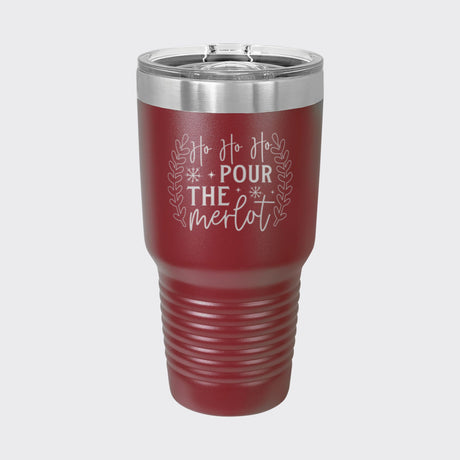 Maroon 30 oz tumbler laser engraved with "Ho Ho Ho, Pour the Merlot"