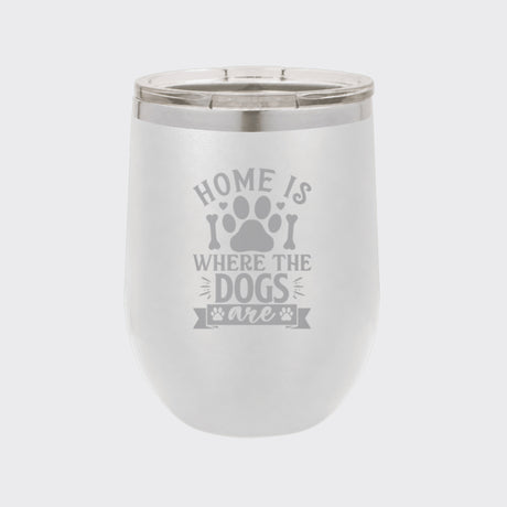 White 12 oz stemless wine tumbler laser engraved with "Home Is Where the Dogs Are"