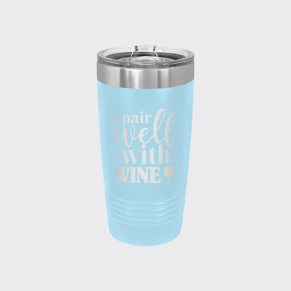 Light Blue 20 oz tumbler laser engraved with "I Pair Well with Wine"