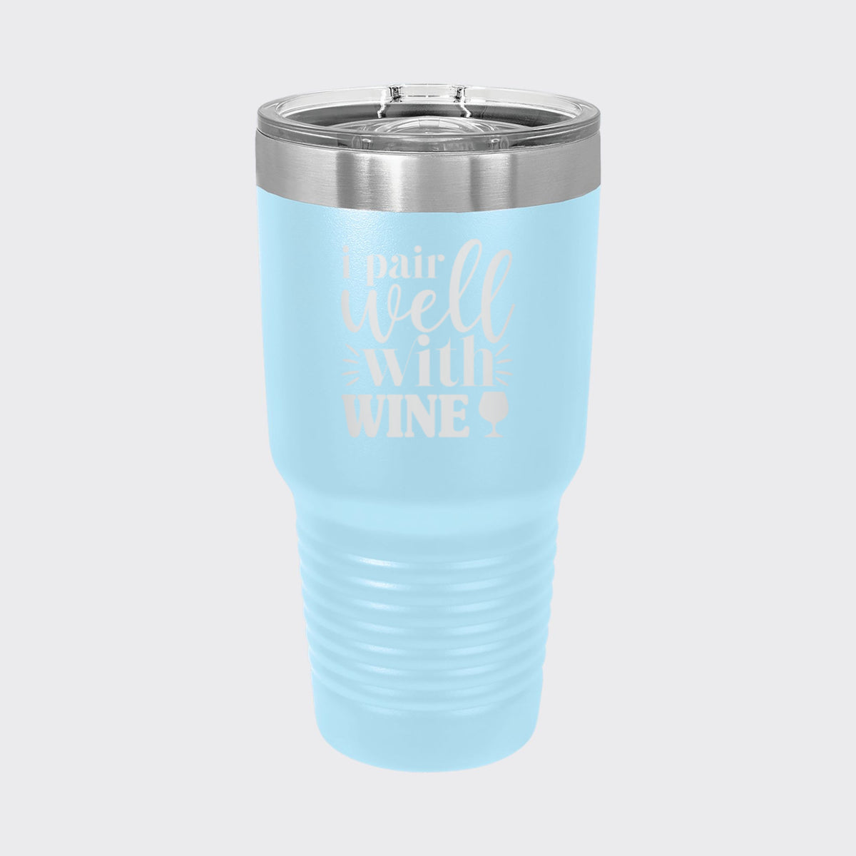 Light Blue 30 oz tumbler laser engraved with "I Pair Well with Wine"