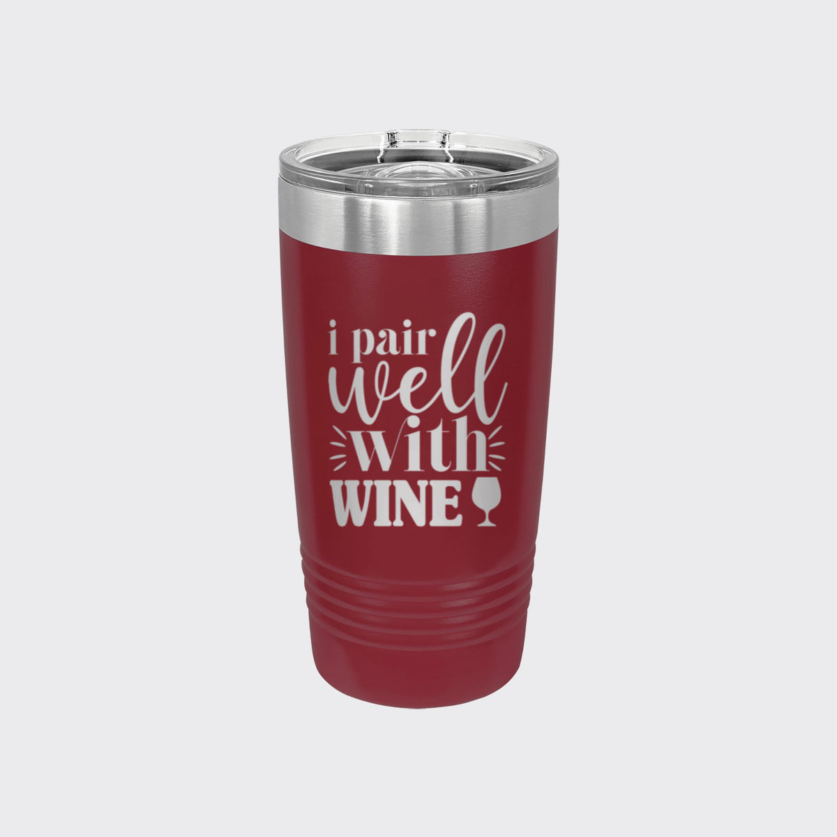 Maroon 20 oz tumbler laser engraved with "I Pair Well with Wine"