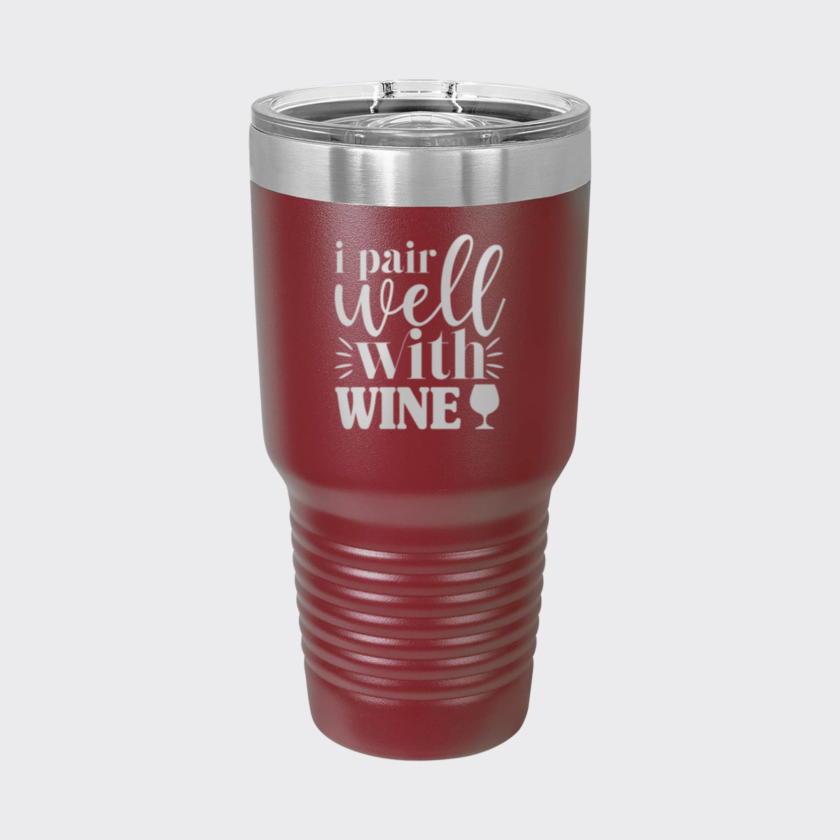 Maroon 30 oz tumbler laser engraved with "I Pair Well with Wine"