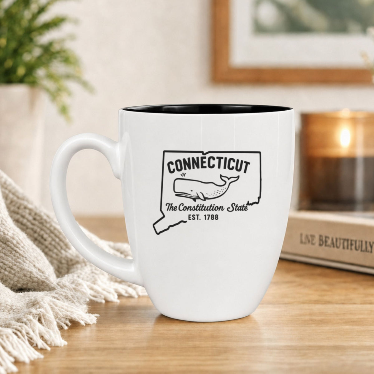 White 16 oz ceramic coffee mug printed with the Connecticut state outline and The Constitution State