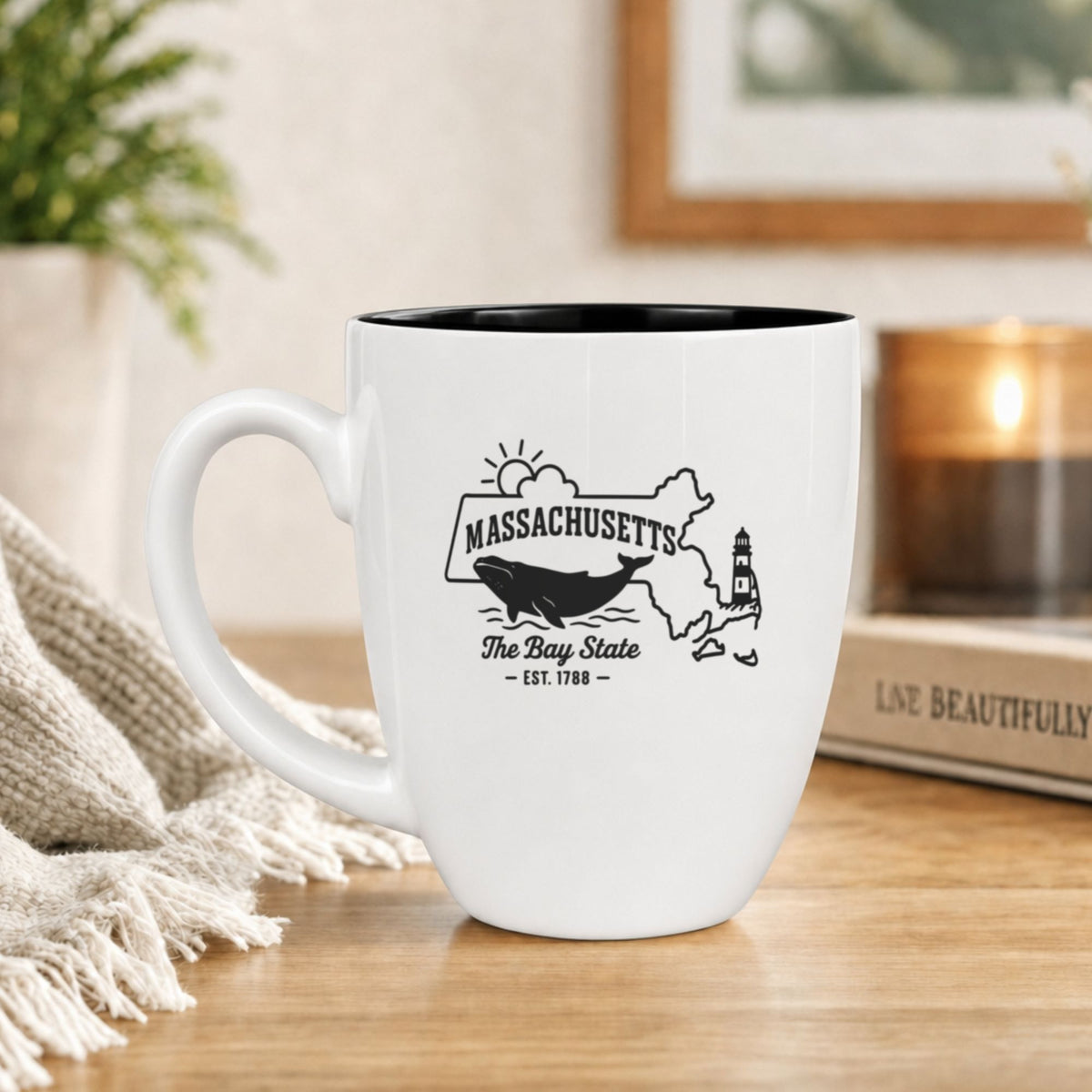 White 16 oz ceramic coffee mug printed with the Massachusetts state outline and The Bay State