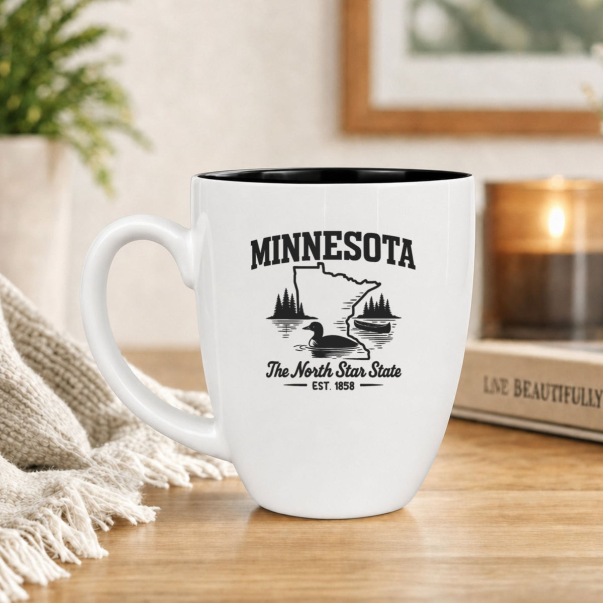 White 16 oz ceramic coffee mug printed with the Minnesota state outline and The North Star State