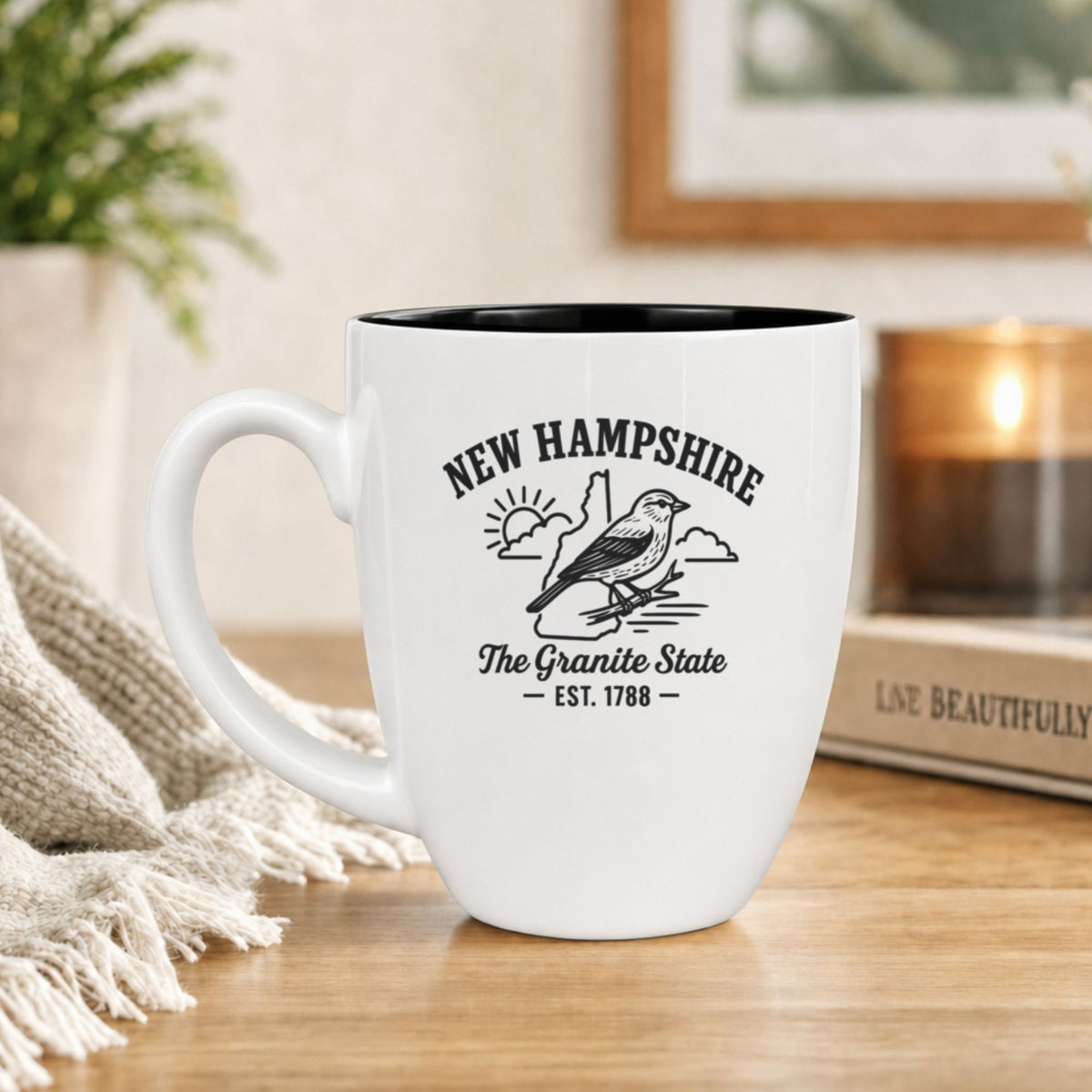 White 16 oz ceramic coffee mug printed with the New Hampshire state outline and The Granite State