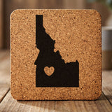 Idaho square cork coaster engraved with the state shape and a heart