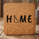 Idaho square cork coaster engraved with HOME using the state outline as the letter O