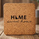 Idaho square cork coaster engraved with HOME sweet home using the state shape as the letter O