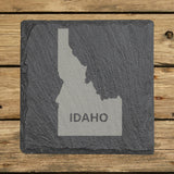 Idaho square slate coaster engraved with the state shape and IDAHO in bold lettering