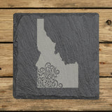 Idaho square slate coaster engraved with the state shape in ornate floral scrollwork