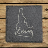 Idaho square slate coaster engraved with a hand-drawn state outline and love in cursive