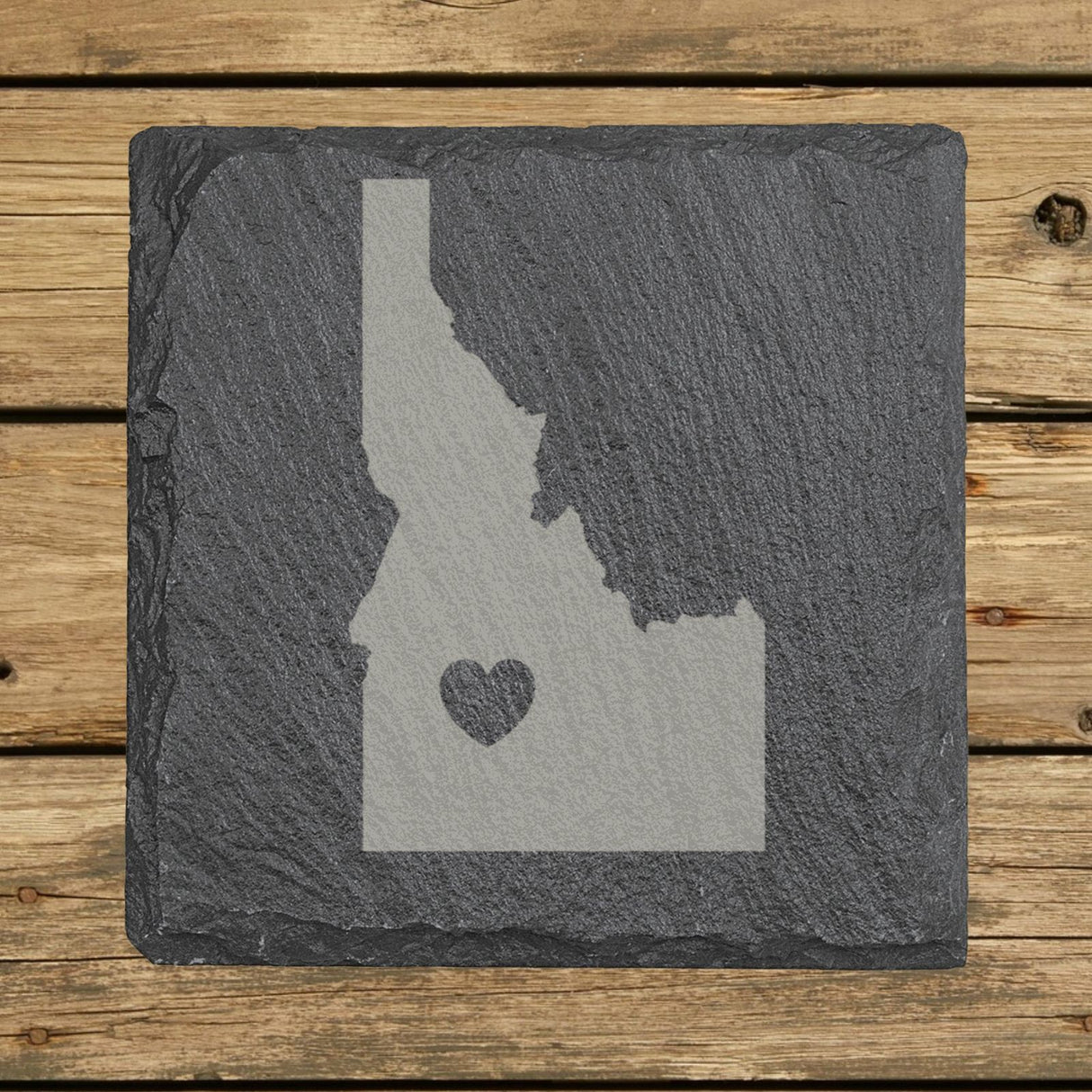 Idaho square slate coaster engraved with the state shape and a heart