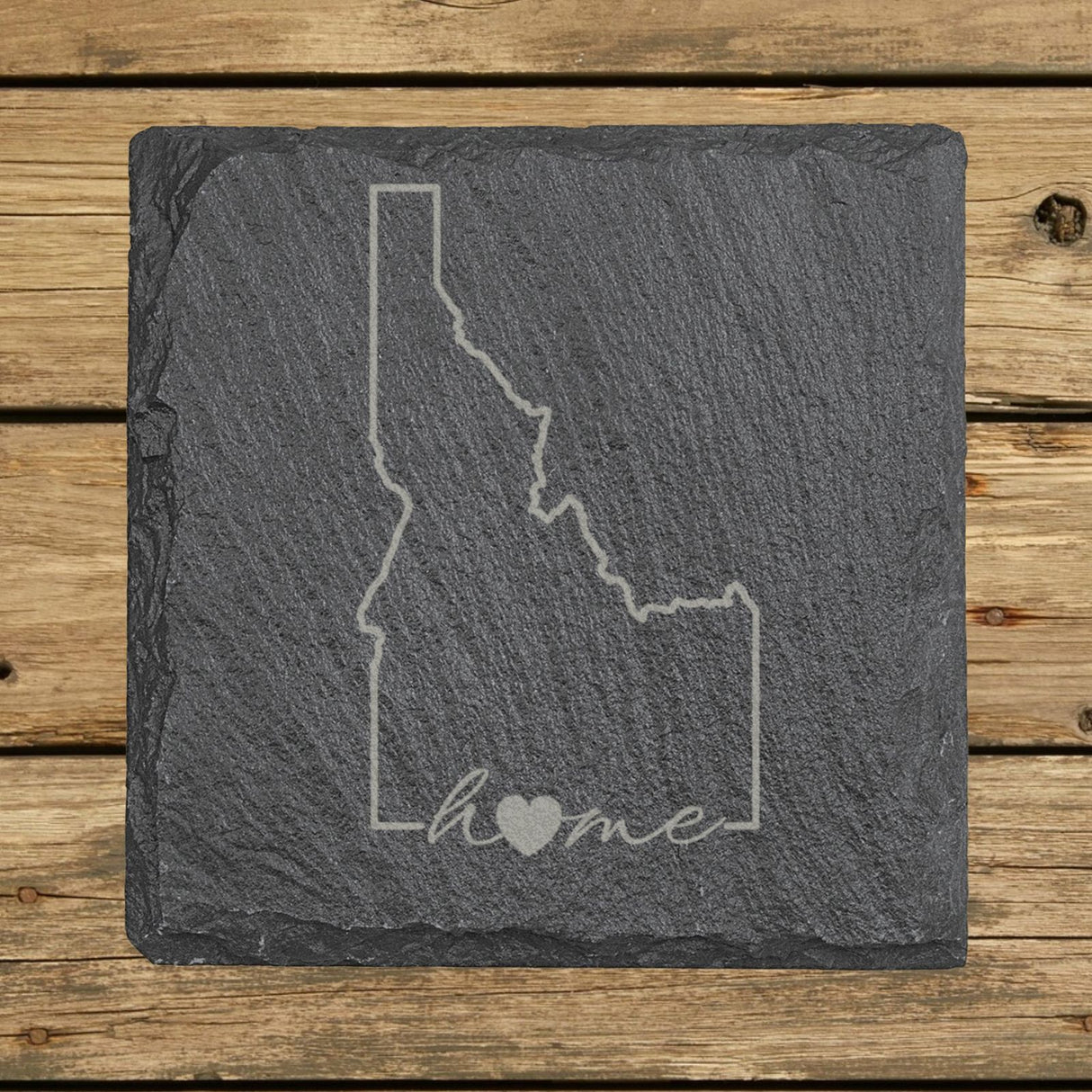 Idaho square slate coaster engraved with the state outline and home in script with a heart