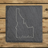 Idaho square slate coaster engraved with the state outline and Idaho in script lettering