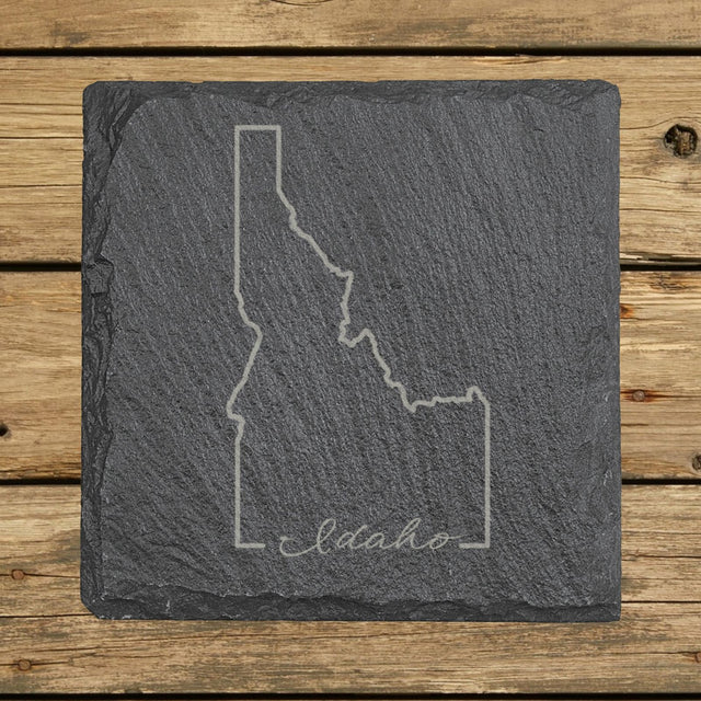 Idaho square slate coaster engraved with the state outline and Idaho in script lettering